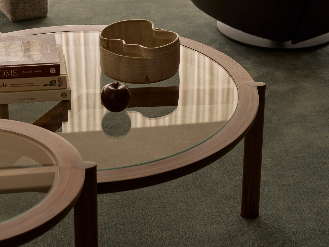 Spoke Tables by BassamFellows, featuring circular timber frames and glass tops.