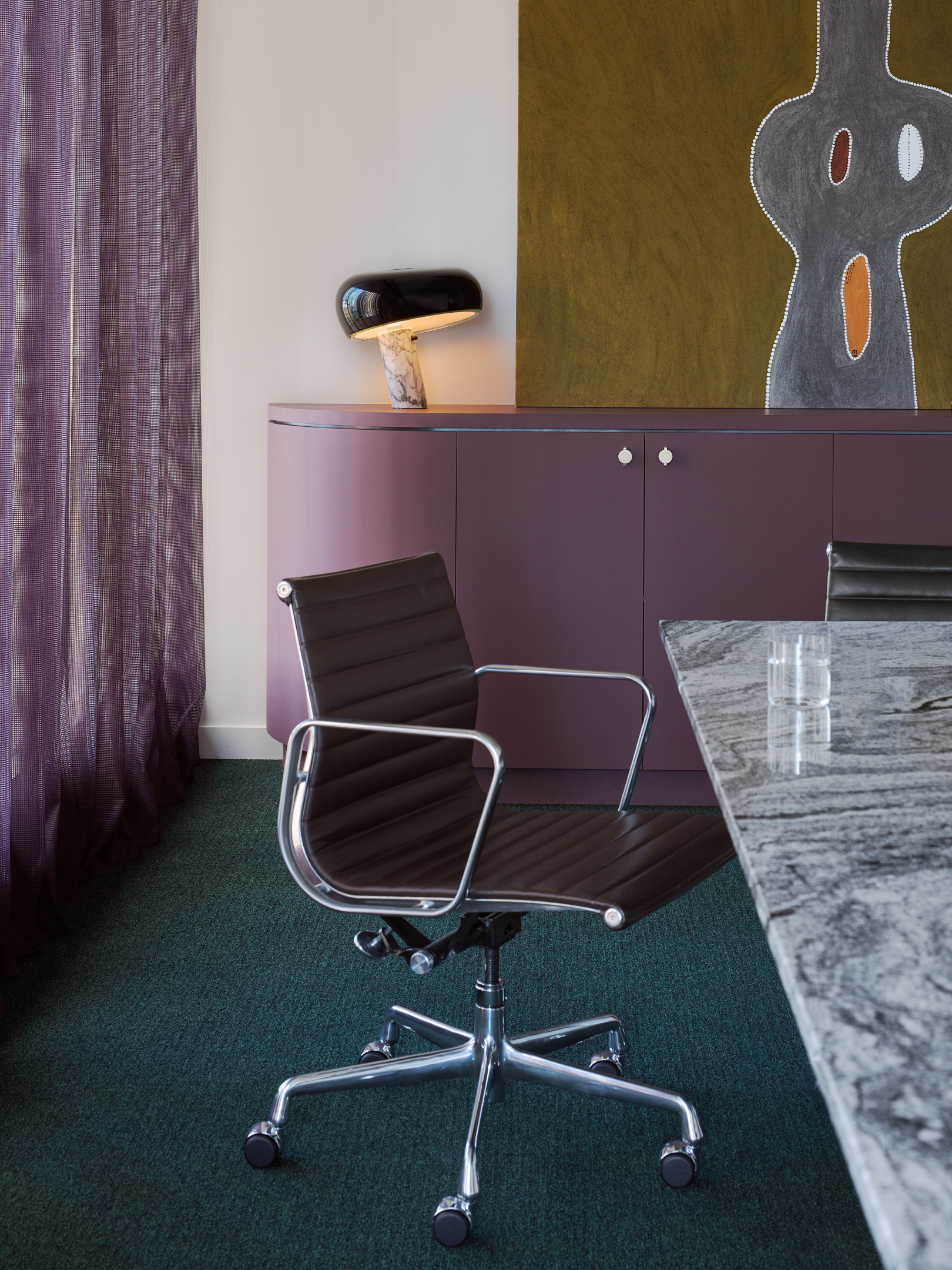 Perth workplace with Snoopy Table Lamp and Eames Aluminium Group Management Armchair