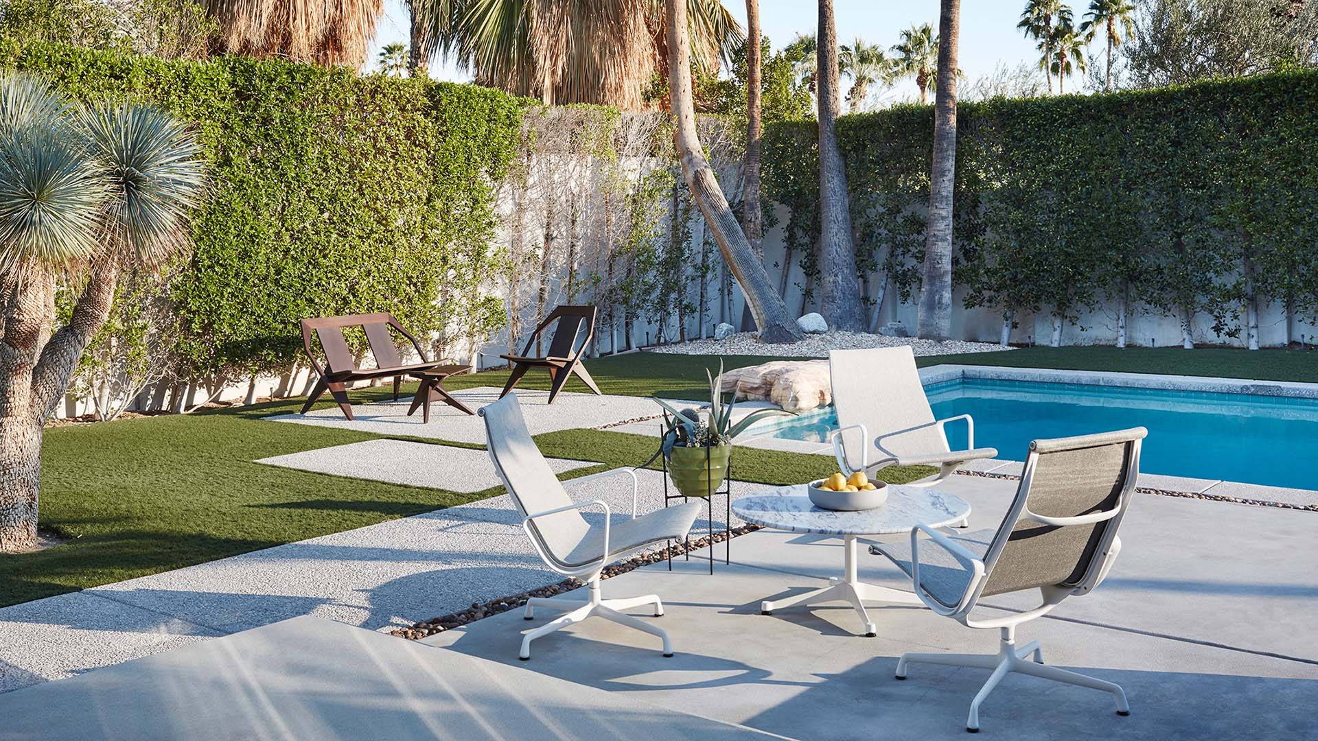 Eames Aluminium Group Outdoor Lounge Chair, Lifestyle